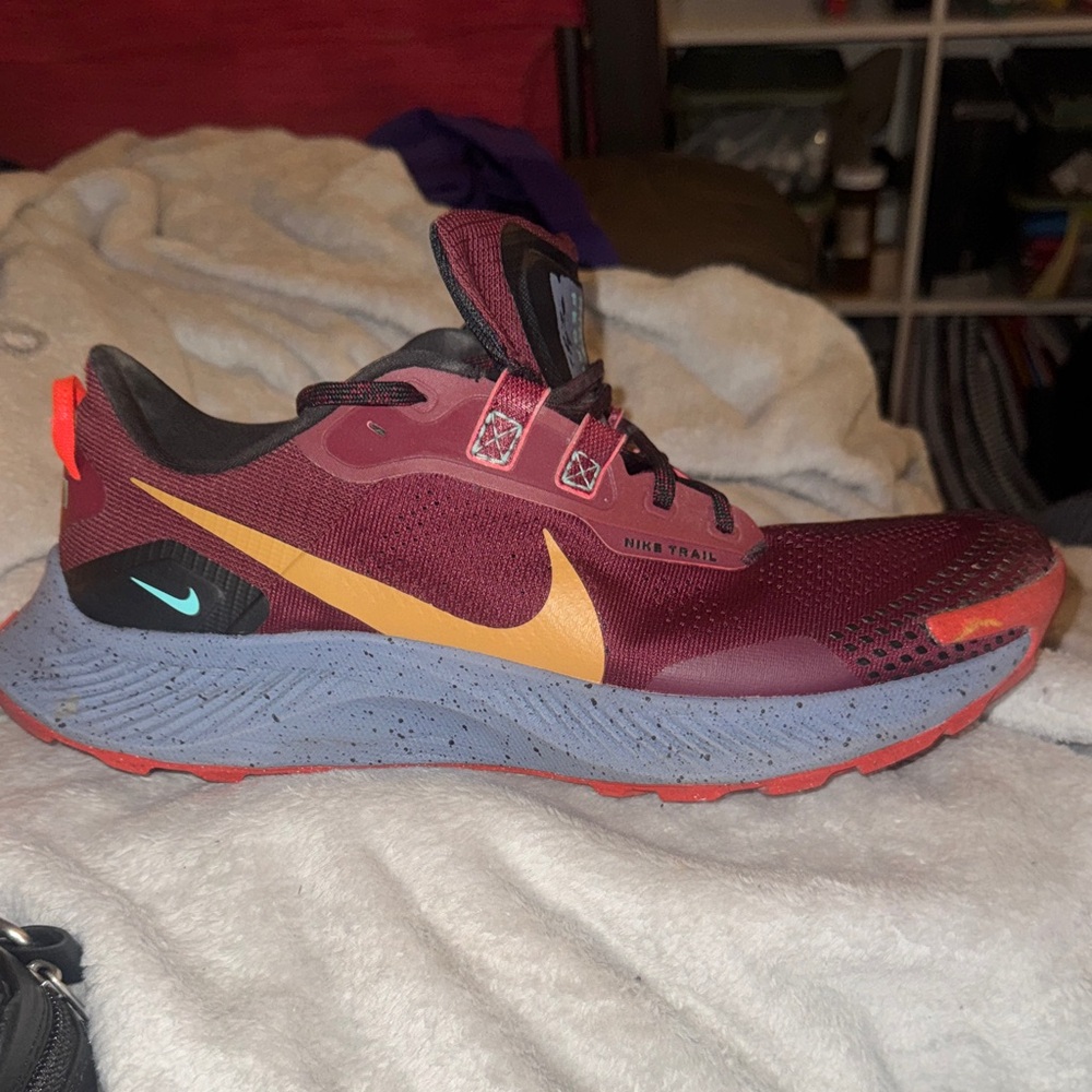Nike Pegasus trail shoes.  Size 12.  Maroon, yellow, and orange.